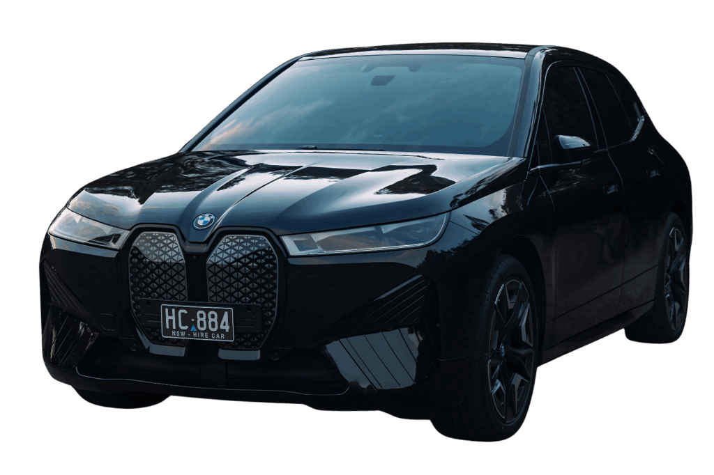 A black BMW iX electric SUV with a glossy finish and a visible "HC·884" hire car license plate, photographed on a transparent background.